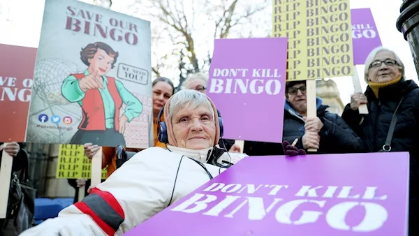 Protestors gather outside Leinster House against 'modest proposal' on bingo prize money