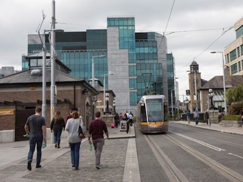 Two people injured in crash between Luas and car