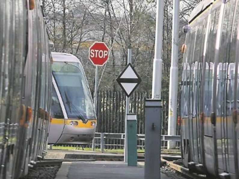 Woman's hair set on fire by teens on Luas