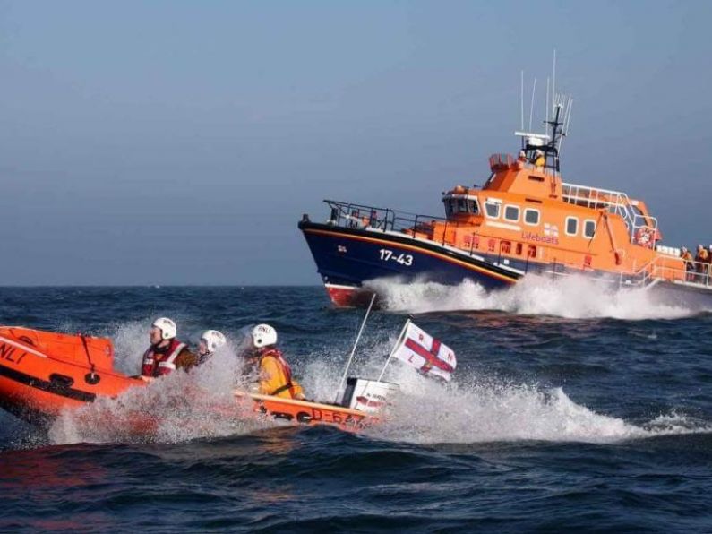 Crews battle six metre waves to prevent drifting cargo ship from hitting rocks