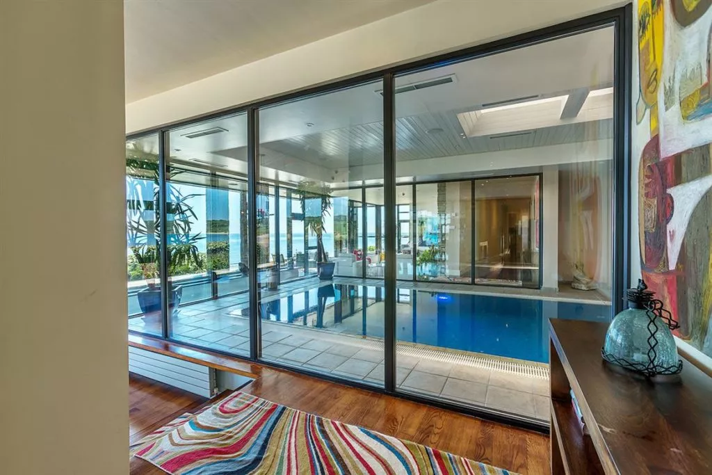 Pool at eye level with the ocean is this Irish coastal home's claim to fame