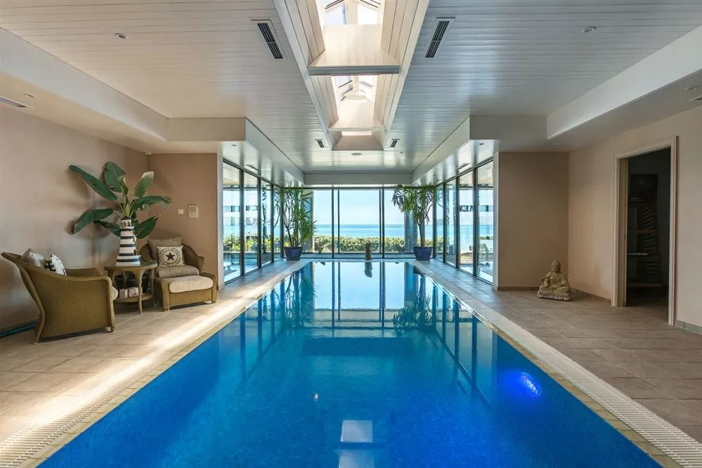 Pool at eye level with the ocean is this Irish coastal home's claim to fame