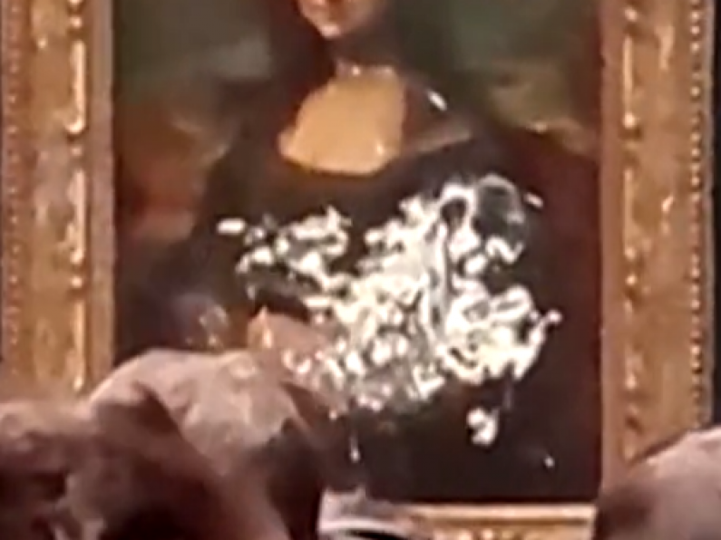 The Mona Lisa has been smeared in cream in protest