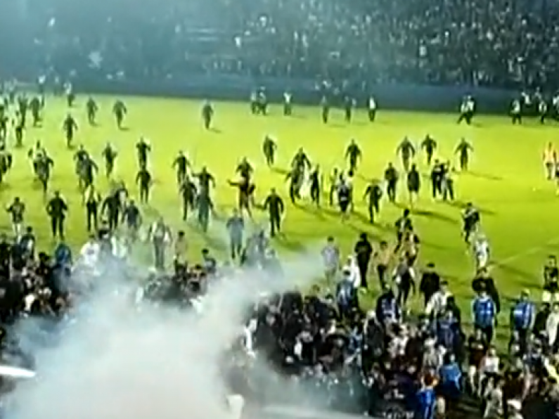 At least 125 dead in one of the world's worst football stadium disasters