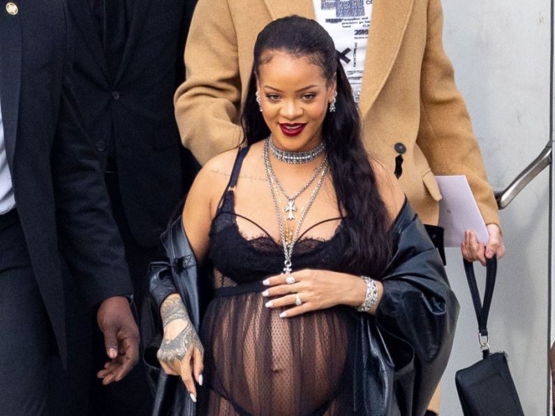 Rihanna stuns in sheer black dress at Dior show