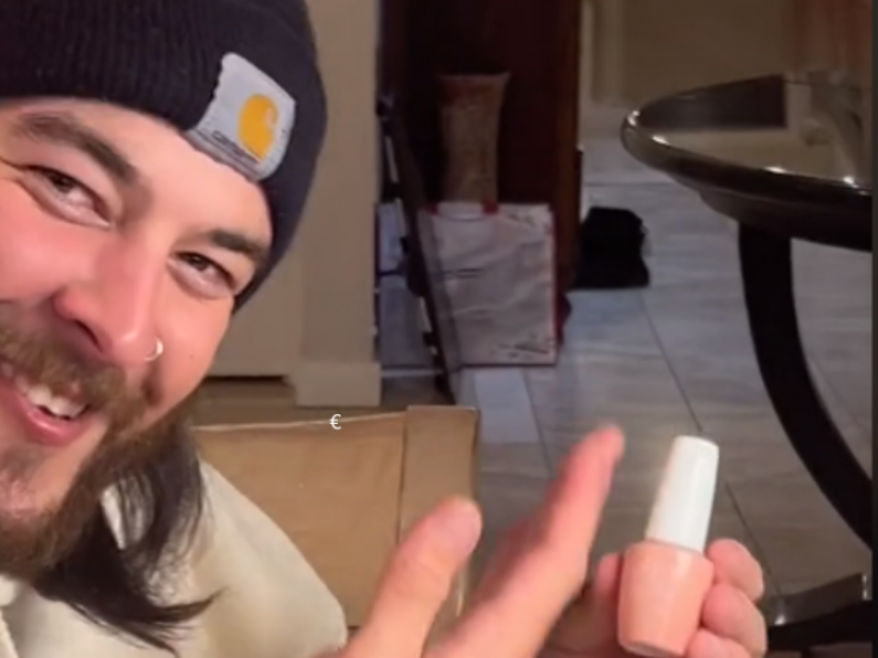 Boyfriend learns how to apply gel nails to save his girlfriend money