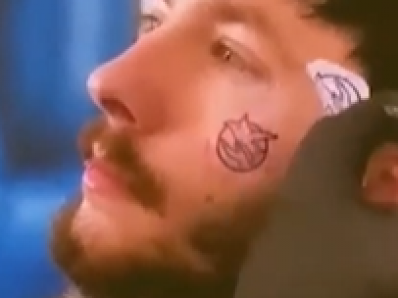 Cork man gets tattoo of social welfare logo on his face