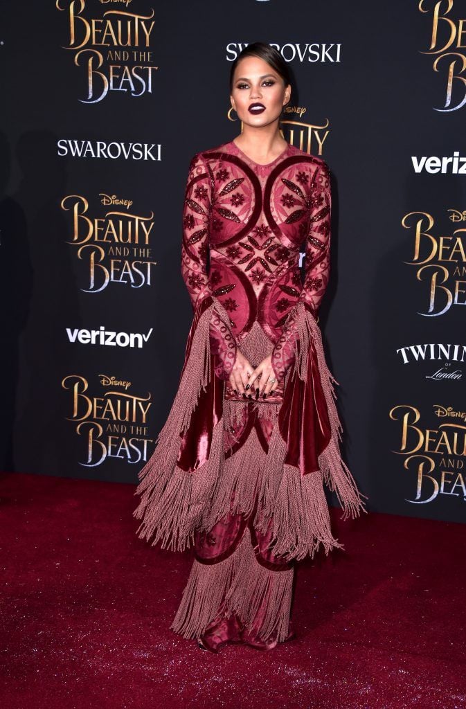 Model Chrissy Teigen attends Disney's "Beauty and the Beast" premiere at El Capitan Theatre on March 2, 2017 in Los Angeles, California.  (Photo by Frazer Harrison/Getty Images)