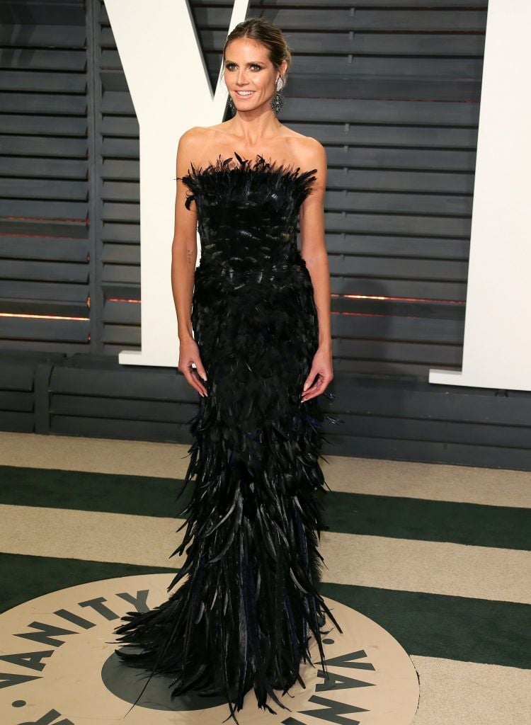 German-American model Heidi Klum poses as she arrives to the Vanity Fair Party following the 88th Academy Awards at The Wallis Annenberg Center for the Performing Arts in Beverly Hills, California, on February 26, 2017.  (Photo by JEAN-BAPTISTE LACROIX/AFP/Getty Images)