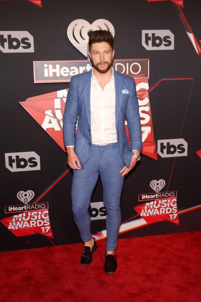 Singer Chris Lane attends the 2017 iHeartRadio Music Awards which broadcast live on Turner's TBS, TNT, and truTV at The Forum on March 5, 2017 in Inglewood, California.  (Photo by Jesse Grant/Getty Images for iHeartMedia)