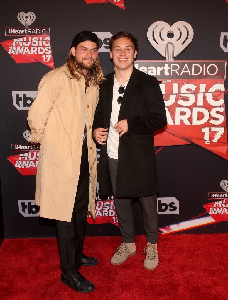 Singer Jake Weary (L) and actor Finn Cole attend the 2017 iHeartRadio Music Awards which broadcast live on Turner's TBS, TNT, and truTV at The Forum on March 5, 2017 in Inglewood, California.  (Photo by Jesse Grant/Getty Images for iHeartMedia)