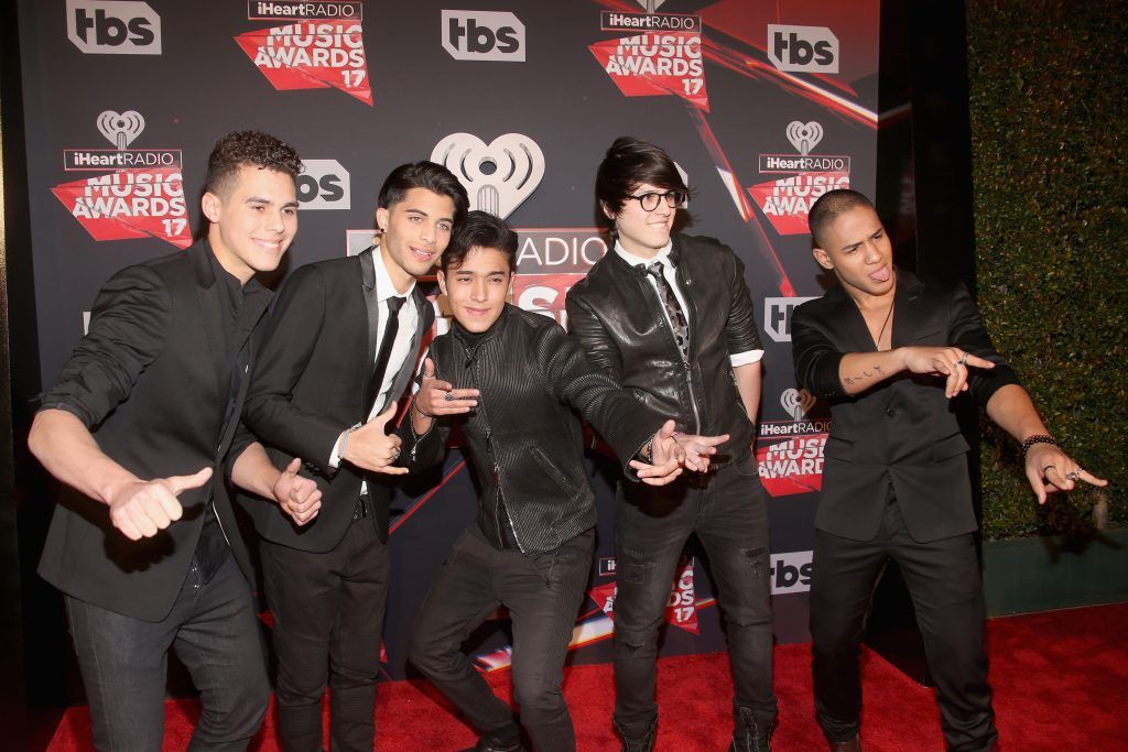 Singers Zabdiel de Jesus, Erick Brian Colon, Joel Pimentel, Christopher Velez and Richard Camacho of the group CNCO attend the 2017 iHeartRadio Music Awards which broadcast live on Turner's TBS, TNT, and truTV at The Forum on March 5, 2017 in Inglewood, California.  (Photo by Jesse Grant/Getty Images for iHeartMedia)