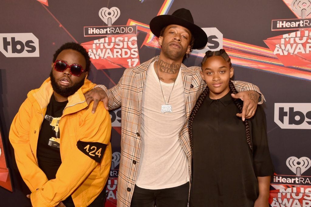 Recording artist Ty Dolla Sign (C) and Jailynn Griffin attend the 2017 iHeartRadio Music Awards which broadcast live on Turner's TBS, TNT, and truTV at The Forum on March 5, 2017 in Inglewood, California.  (Photo by Frazer Harrison/Getty Images for iHeartMedia)