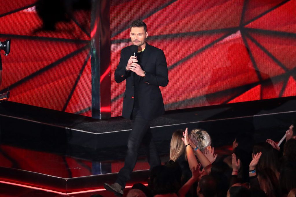 Host Ryan Seacrest speaks onstage at the 2017 iHeartRadio Music Awards which broadcast live on Turner's TBS, TNT, and truTV at The Forum on March 5, 2017 in Inglewood, California.  (Photo by Rich Polk/Getty Images for iHeartMedia)