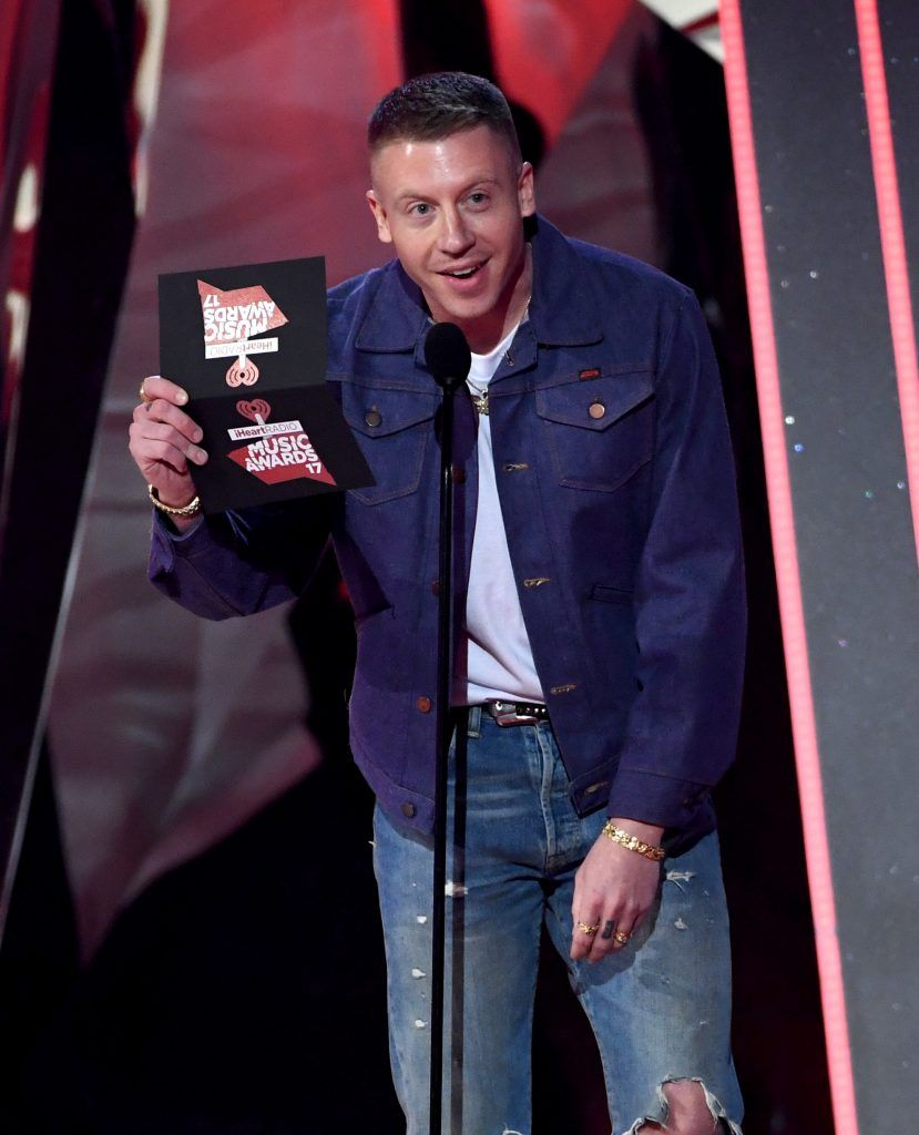 Rapper Macklemore speaks onstage at the 2017 iHeartRadio Music Awards which broadcast live on Turner's TBS, TNT, and truTV at The Forum on March 5, 2017 in Inglewood, California.  (Photo by Kevin Winter/Getty Images for iHeartMedia)