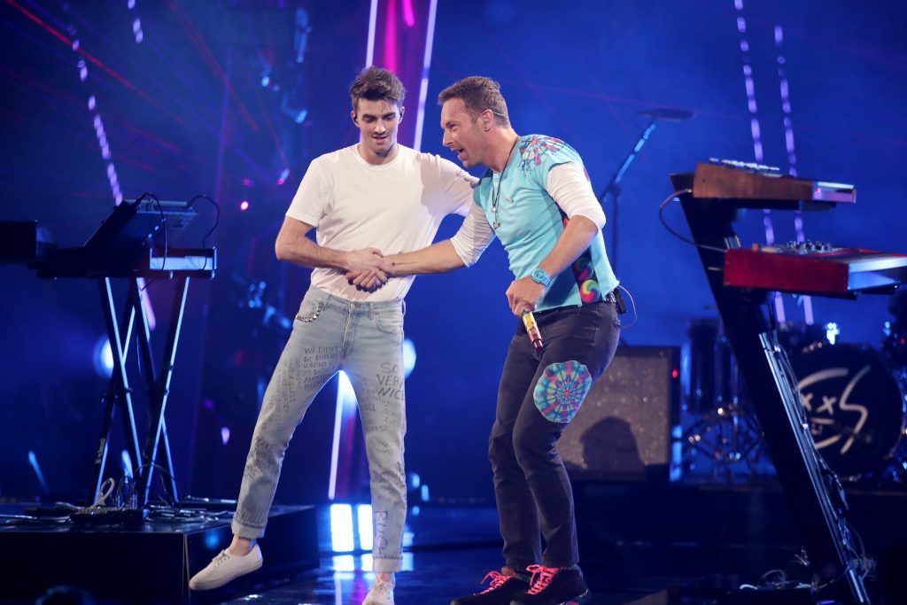 Recording artists Andrew Taggart (L) of The Chainsmokers and Chris Martin perform onstage at the 2017 iHeartRadio Music Awards which broadcast live on Turner's TBS, TNT, and truTV at The Forum on March 5, 2017 in Inglewood, California.  (Photo by Christopher Polk/Getty Images for iHeartMedia)