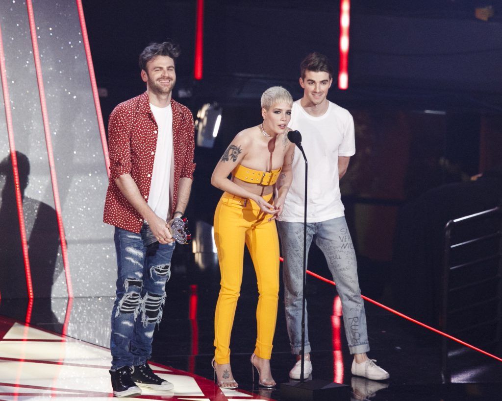 Singer Halsey (C) and DJs Alex Pall (L) and Andrew Taggart (R) of The Chainsmokers accept the Dance Song of the Year award for 'Closer' onstage at the 2017 iHeartRadio Music Awards which broadcast live on Turner's TBS, TNT, and truTV at The Forum on March 5, 2017 in Inglewood, California.  (Photo by Rich Polk/Getty Images for iHeartMedia)