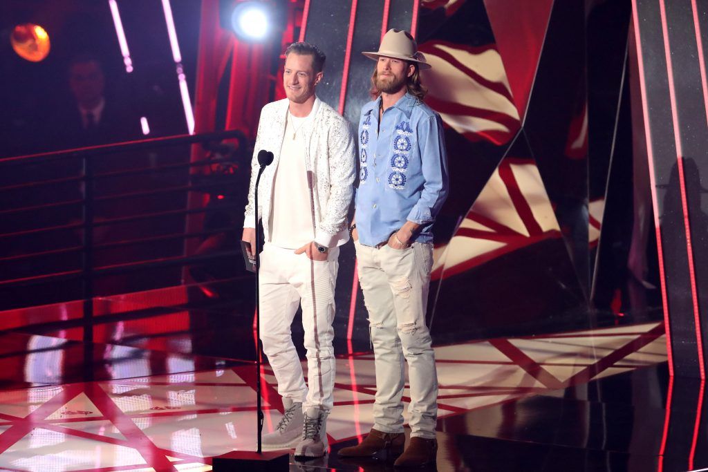 Singer-songwriters Tyler Hubbard (L) and Brian Kelley of Florida Georgia Line speak onstage at the 2017 iHeartRadio Music Awards which broadcast live on Turner's TBS, TNT, and truTV at The Forum on March 5, 2017 in Inglewood, California.  (Photo by Rich Polk/Getty Images for iHeartMedia)