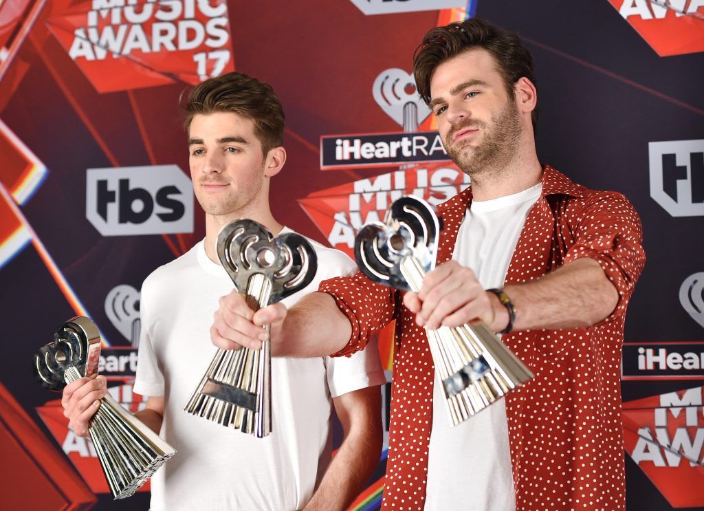Recording artists Andrew Taggart (L) and Alex Pall of music group The Chainsmokers, winners of the Best New Artist award, Dance Song of the Year award for 'Closer,' and Best New Pop Artist award, pose in the press room at the 2017 iHeartRadio Music Awards which broadcast live on Turner's TBS, TNT, and truTV at The Forum on March 5, 2017 in Inglewood, California.  (Photo by Alberto E. Rodriguez/Getty Images)