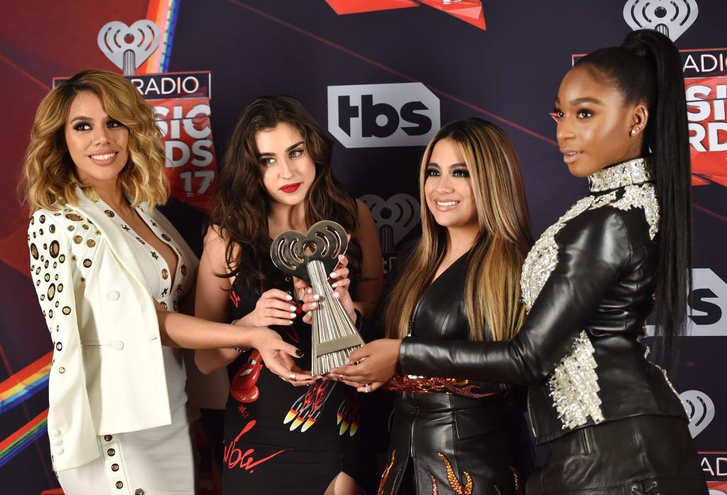 (L-R) Singers Dinah Jane, Lauren Jauregui, Ally Brooke, and Normani Kordei of Fifth Harmony, who accepted the award for Best Fan Army, pose in the press room at the 2017 iHeartRadio Music Awards which broadcast live on Turner's TBS, TNT, and truTV at The Forum on March 5, 2017 in Inglewood, California.  (Photo by Alberto E. Rodriguez/Getty Images)
