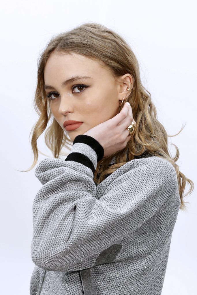 French-US actress Lily-Rose Depp poses during the photocall before the Chanel women's Fall-Winter ready-to-wear collection fashion show in Paris on March 7, 2017.   (Photo by FRANCOIS GUILLOT/AFP/Getty Images)