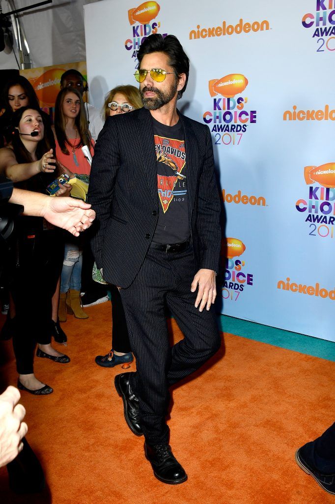 Actor John Stamos at Nickelodeon's 2017 Kids' Choice Awards at USC Galen Center on March 11, 2017 in Los Angeles, California.  (Photo by Frazer Harrison/Getty Images)