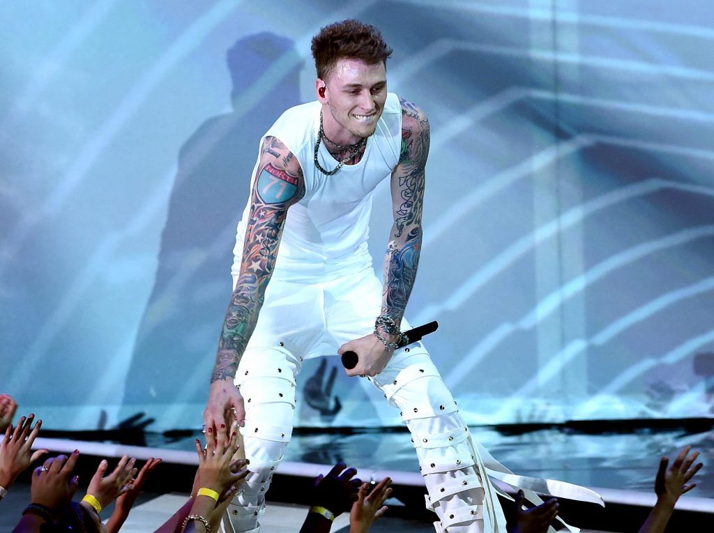 Recording artist Machine Gun Kelly performs onstage at Nickelodeon's 2017 Kids' Choice Awards at USC Galen Center on March 11, 2017 in Los Angeles, California.  (Photo by Kevin Winter/Getty Images)