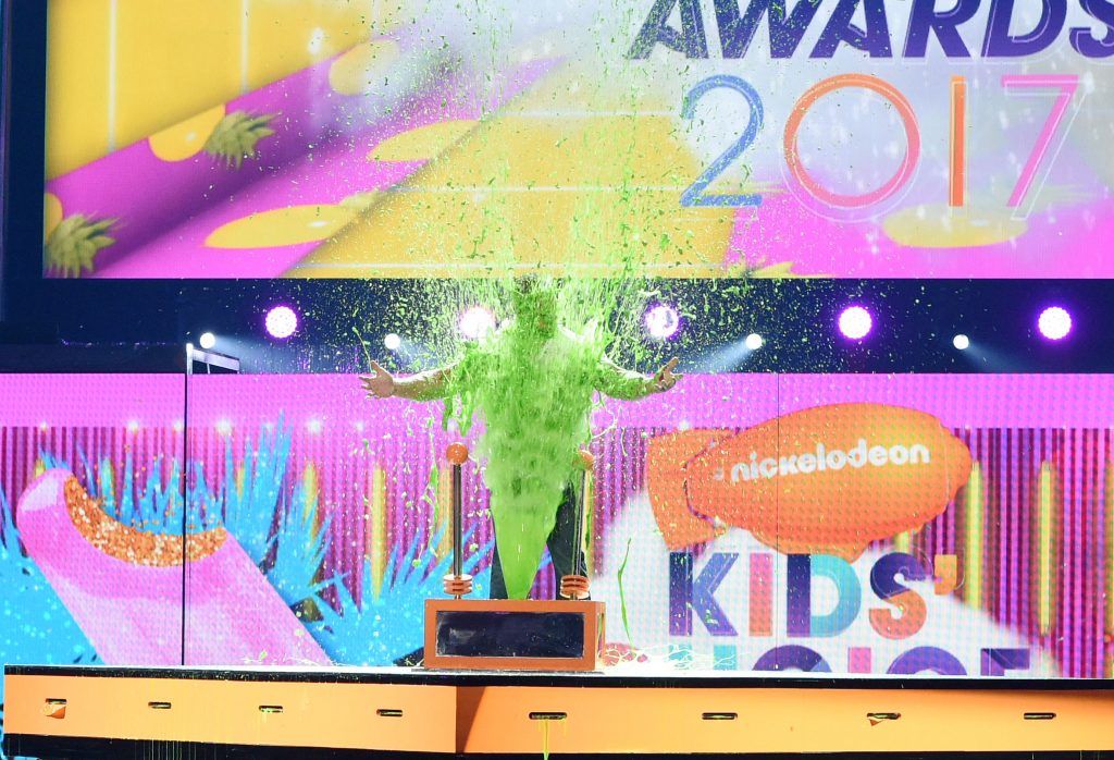 Host John Cena gets slimed onstage at Nickelodeon's 2017 Kids' Choice Awards at USC Galen Center on March 11, 2017, in Los Angeles, California. (Photo by VALERIE MACON/AFP/Getty Images)