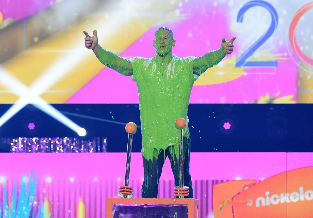 Host John Cena gets slimed onstage at Nickelodeon's 2017 Kids' Choice Awards at USC Galen Center on March 11, 2017, in Los Angeles, California. (Photo by VALERIE MACON/AFP/Getty Images)