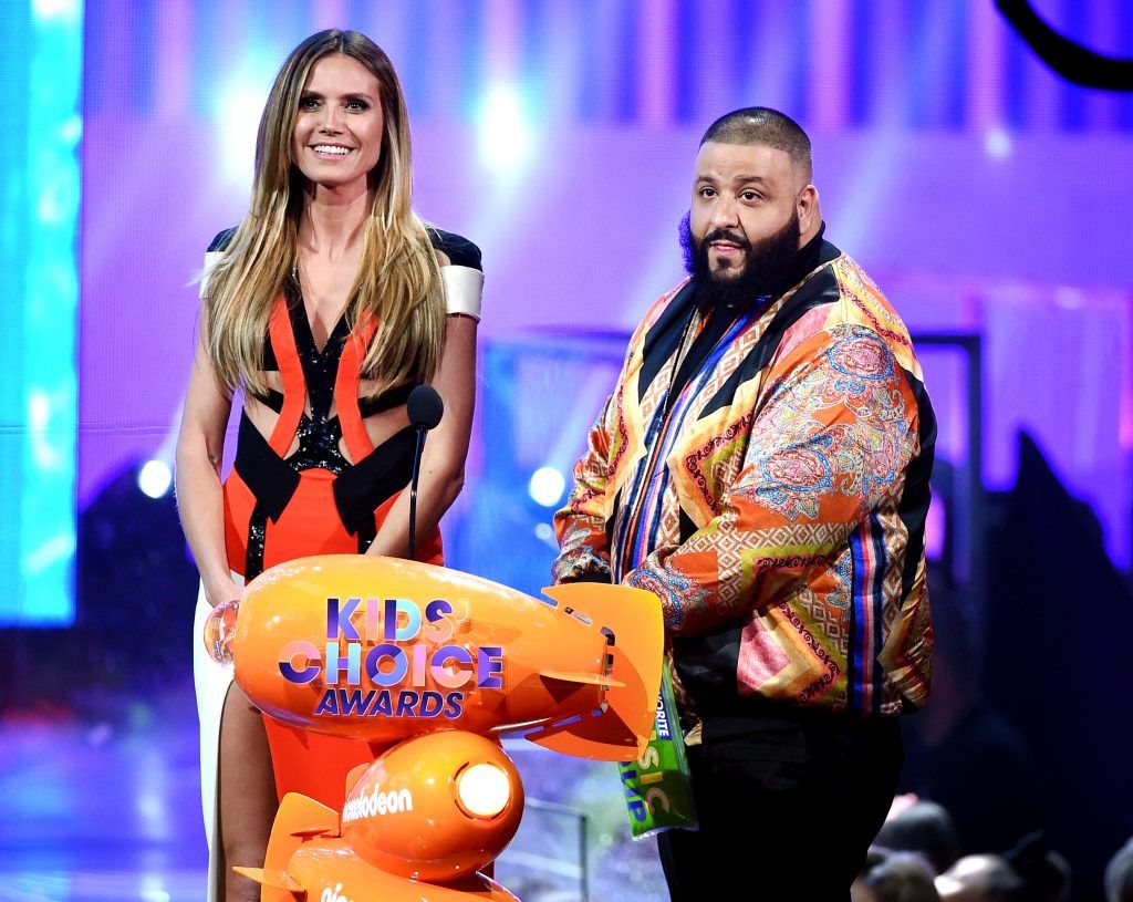 Model Heidi Klum (L) and DJ Khaled speak onstage at Nickelodeon's 2017 Kids' Choice Awards at USC Galen Center on March 11, 2017 in Los Angeles, California.  (Photo by Kevin Winter/Getty Images)