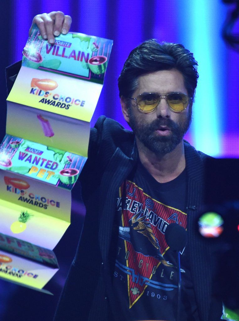 John Stamos on stage at the 30th Annual Nickelodeon Kids' Choice Awards, March 11, 2017, at the Galen Center on the University of Southern California campus in Los Angeles. (Photo by VALERIE MACON/AFP/Getty Images)