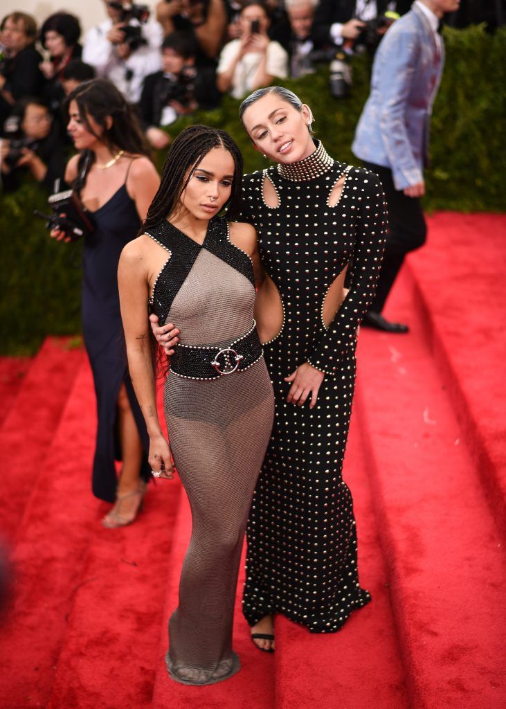 Zoe Kravitz and Miley Cyrus attend the "China: Through The Looking Glass" Costume Institute Benefit Gala at the Metropolitan Museum of Art on May 4, 2015 in New York City.  (Photo by Andrew H. Walker/Getty Images for Variety)