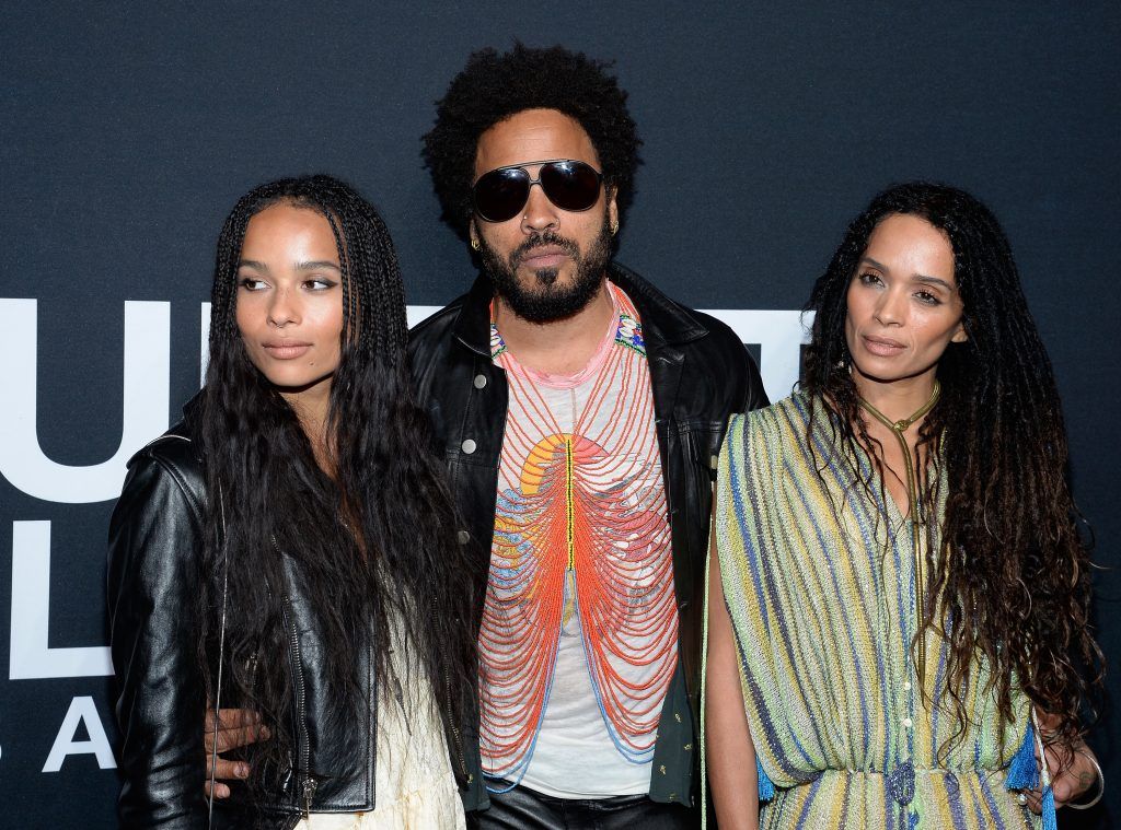 Lenny Kravitz (center) and actresses Zoe Kravitz (L) and Lisa Bonet R) attend the Saint Laurent show at The Hollywood Palladium on February 10, 2016 in Los Angeles, California.  (Photo by Kevork Djansezian/Getty Images)