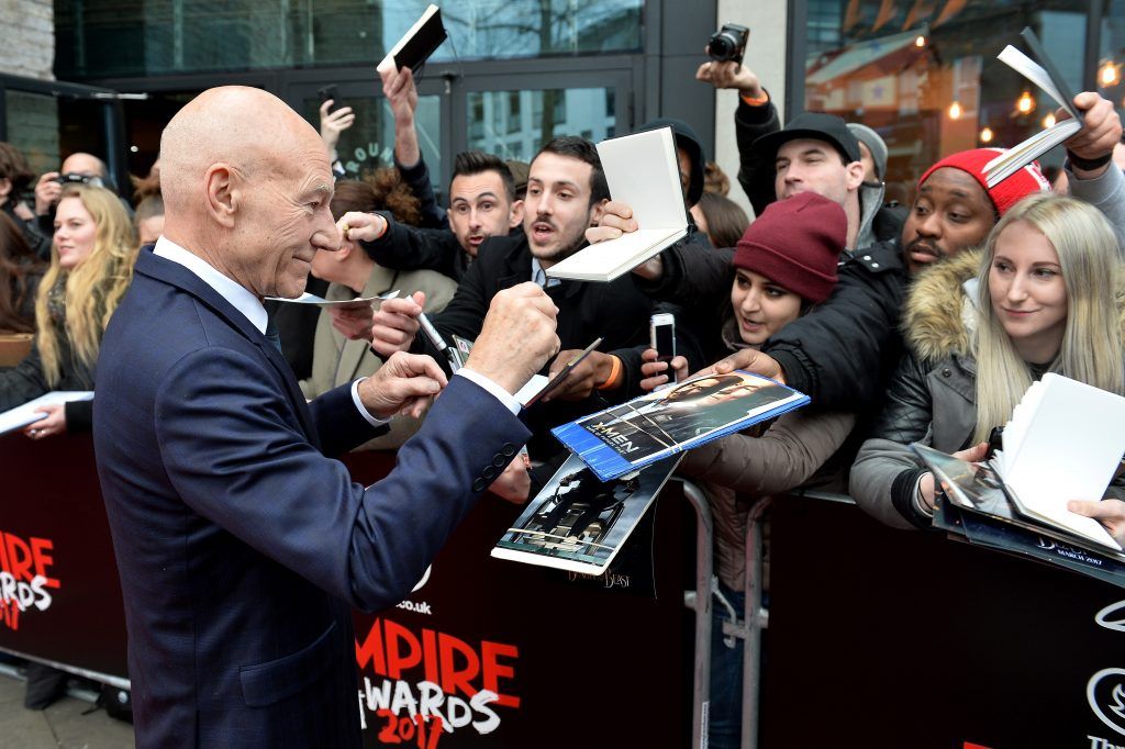 Actor Sir Patrick Stewart signs autographs at the THREE Empire awards at The Roundhouse on March 19, 2017 in London, England.  (Photo by Jeff Spicer/Getty Images)