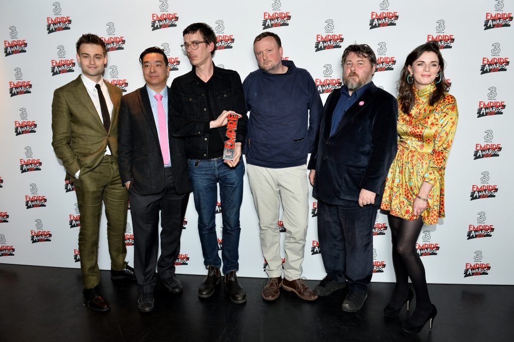 Winners of the Best Comedy award, director Jim Hoskings (3rdL) and producer Andrew Starke (3rdR) pose in the winners room with presenter Douglas Booth (L) and Aisling Bea (R) at the THREE Empire awards at The Roundhouse on March 19, 2017 in London, England.  (Photo by Jeff Spicer/Getty Images)