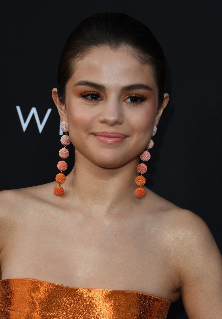 Actress/singer Selena Gomez arrives for the premiere Of Netflix's '13 Reasons Why' at Paramount Pictures Studio in Los Angeles, California on March 30, 2017. (Photo by MARK RALSTON/AFP/Getty Images)
