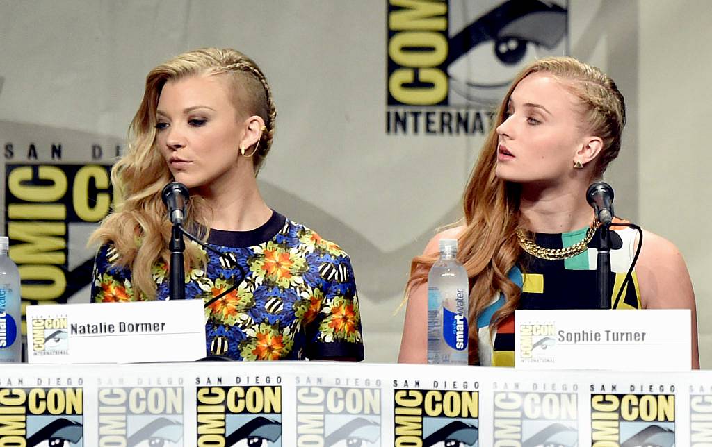 Natalie Dormer (L) and Sophie Turner attend HBO's "Game Of Thrones" panel and Q&A during Comic-Con International 2014 at San Diego Convention Center on July 25, 2014 in San Diego, California.  (Photo by Kevin Winter/Getty Images)