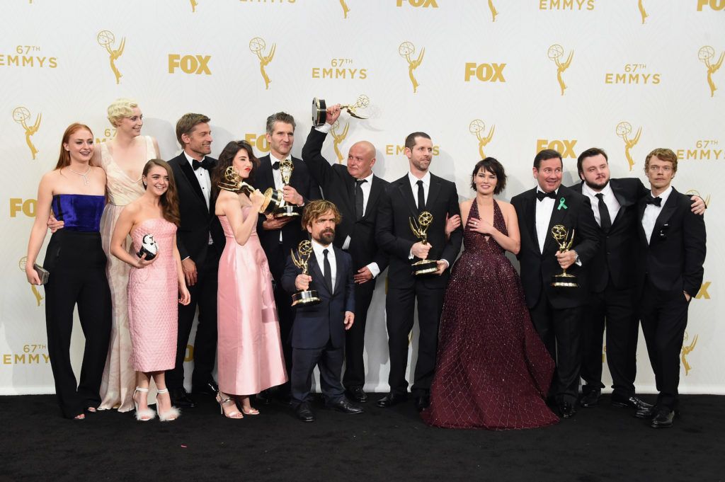 Sophie Turner with some of the cast, writers and directors of 'Game of Thrones', as they pose in the press room at the 67th Annual Primetime Emmy Awards at Microsoft Theater on September 20, 2015 in Los Angeles, California. (Photo by Jason Merritt/Getty Images)