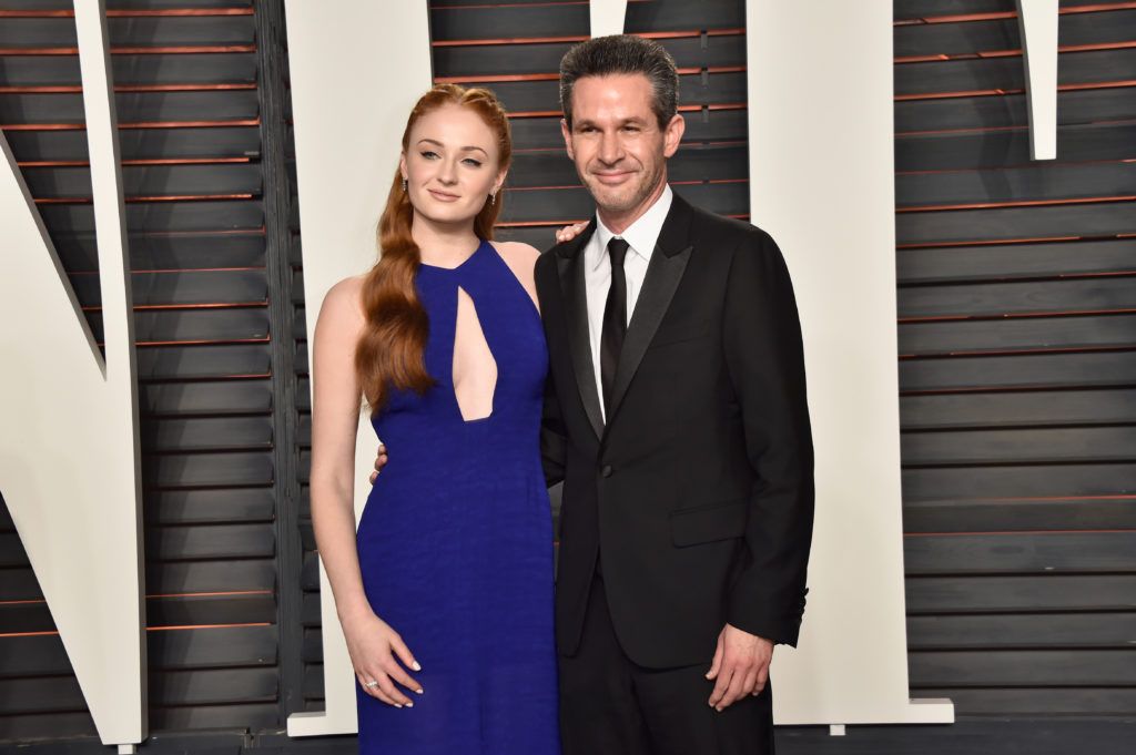 Sophie Turner (L) and Simon Kinberg attend the 2016 Vanity Fair Oscar Party Hosted By Graydon Carter at the Wallis Annenberg Center for the Performing Arts on February 28, 2016 in Beverly Hills, California.  (Photo by Pascal Le Segretain/Getty Images)