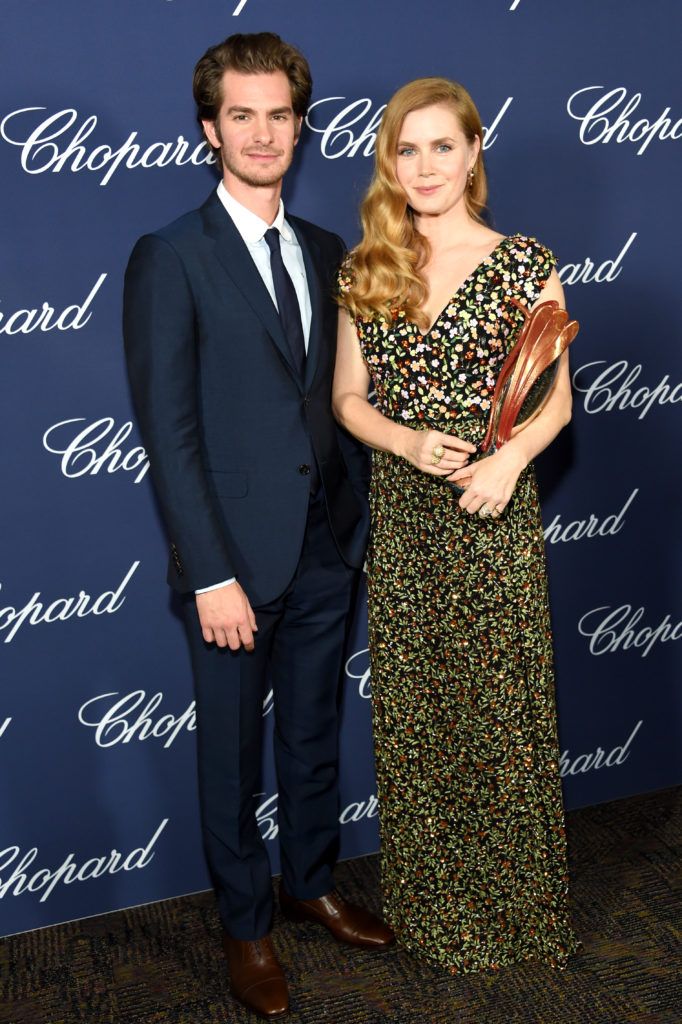 Amy Adams poses with the Chairman's Award and actor Andrew Garfield during the 28th Annual Palm Springs International Film Festival Film Awards Gala at the Palm Springs Convention Center on January 2, 2017 in Palm Springs, California.  (Photo by Michael Kovac/Getty Images for Palm Springs International Film Festival)