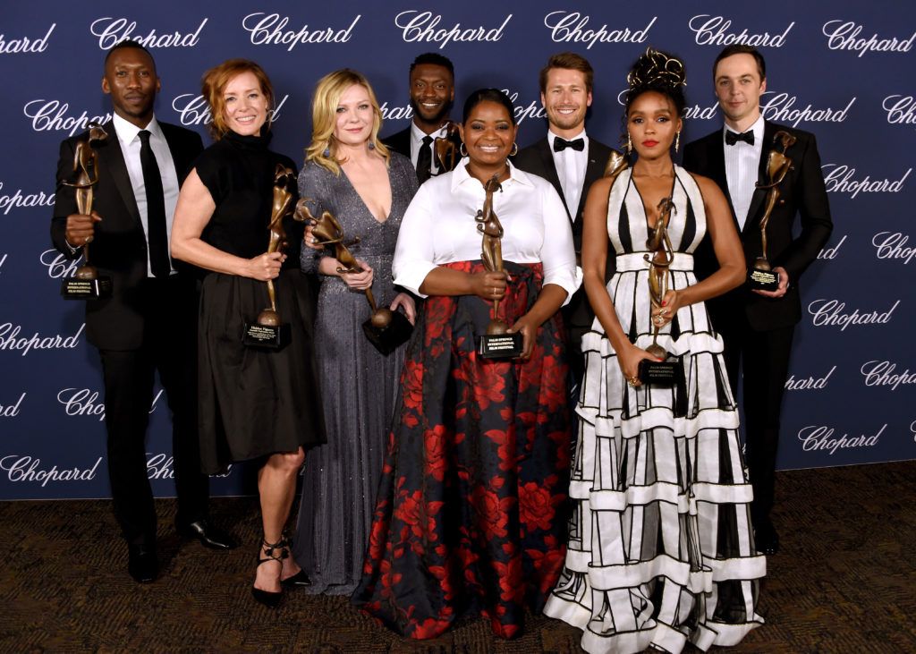 Mahershala Ali, Kimberly Quinn, Kirsten Dunst, Aldis Hodge, Octavia Spencer, Glen Powell, Janelle Monae and Jim Parsons pose with the Ensemble Performance Award during the 28th Annual Palm Springs International Film Festival Film Awards Gala at the Palm Springs Convention Center on January 2, 2017 in Palm Springs, California.  (Photo by Michael Kovac/Getty Images for Palm Springs International Film Festival)