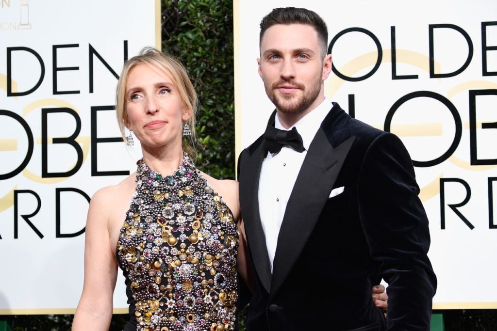 BEVERLY HILLS, CA - JANUARY 08:  Director Sam Taylor-Johnson (L) and actor Aaron Taylor-Johnson attends the 74th Annual Golden Globe Awards at The Beverly Hilton Hotel on January 8, 2017 in Beverly Hills, California.  (Photo by Frazer Harrison/Getty Images)