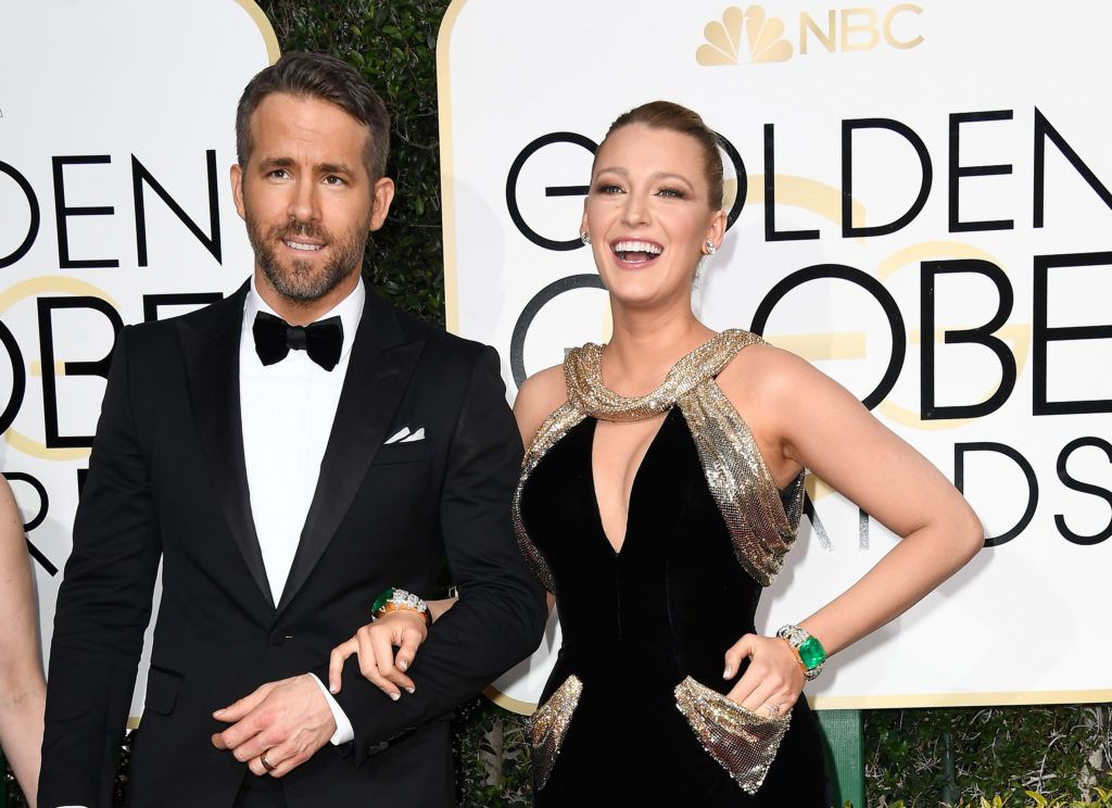 BEVERLY HILLS, CA - JANUARY 08:  Actors Ryan Reynolds (L) and Blake Lively attend the 74th Annual Golden Globe Awards at The Beverly Hilton Hotel on January 8, 2017 in Beverly Hills, California.  (Photo by Frazer Harrison/Getty Images)