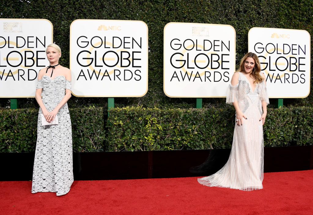 BEVERLY HILLS, CA - JANUARY 08:  Actresses Michelle Williams (L) and Drew Barrymore attend the 74th Annual Golden Globe Awards at The Beverly Hilton Hotel on January 8, 2017 in Beverly Hills, California.  (Photo by Frazer Harrison/Getty Images)