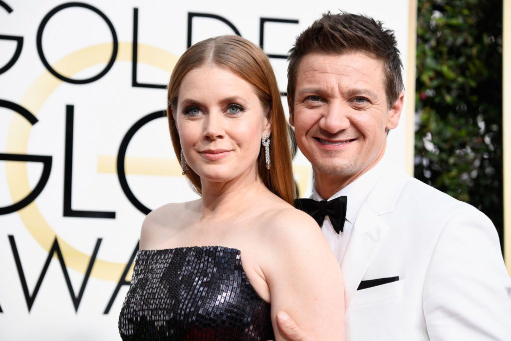 BEVERLY HILLS, CA - JANUARY 08: Actors Amy Adams and Jeremy Renner attend the 74th Annual Golden Globe Awards at The Beverly Hilton Hotel on January 8, 2017 in Beverly Hills, California.  (Photo by Frazer Harrison/Getty Images)