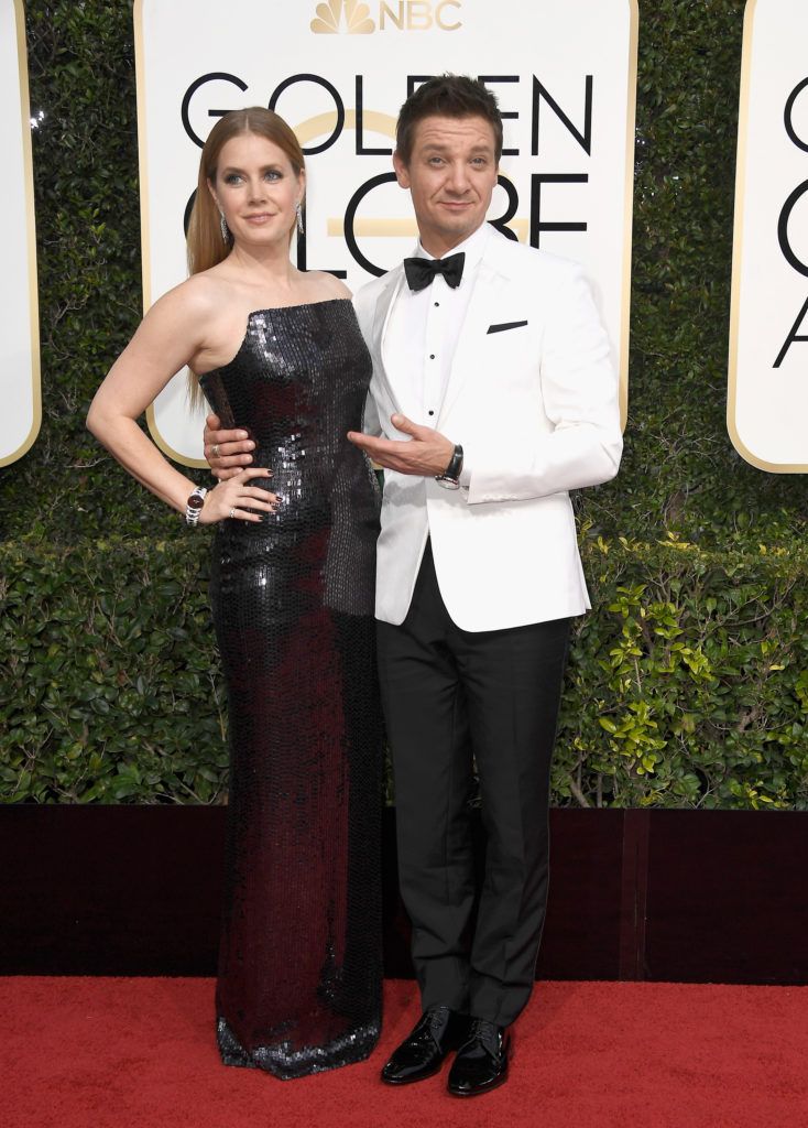 BEVERLY HILLS, CA - JANUARY 08: Actors Amy Adams and Jeremy Renner attend the 74th Annual Golden Globe Awards at The Beverly Hilton Hotel on January 8, 2017 in Beverly Hills, California.  (Photo by Frazer Harrison/Getty Images)