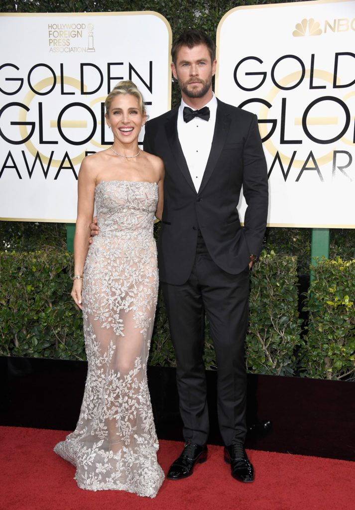 BEVERLY HILLS, CA - JANUARY 08:  Actor Chris Hemsworth (R) and model Elsa Pataky attend the 74th Annual Golden Globe Awards at The Beverly Hilton Hotel on January 8, 2017 in Beverly Hills, California.  (Photo by Frazer Harrison/Getty Images)