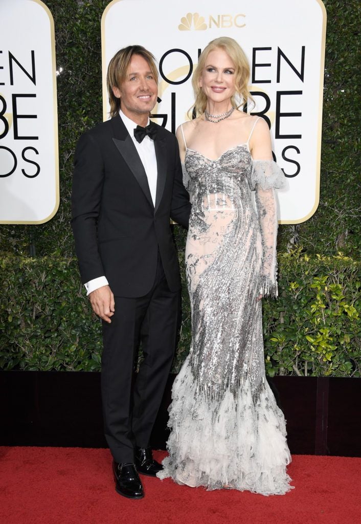 BEVERLY HILLS, CA - JANUARY 08:  Musician Keith Urban and actress Nicole Kidman attend the 74th Annual Golden Globe Awards at The Beverly Hilton Hotel on January 8, 2017 in Beverly Hills, California.  (Photo by Frazer Harrison/Getty Images)