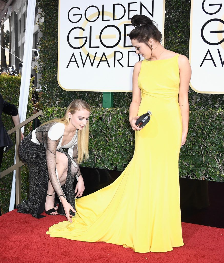 BEVERLY HILLS, CA - JANUARY 08: Actresses Sophie Turner (L) and Maisie Williams attend the 74th Annual Golden Globe Awards at The Beverly Hilton Hotel on January 8, 2017 in Beverly Hills, California.  (Photo by Frazer Harrison/Getty Images)