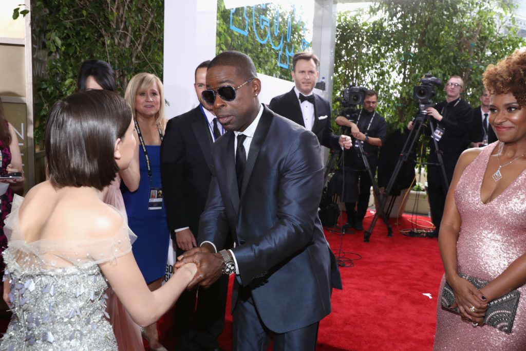 BEVERLY HILLS, CA - JANUARY 08:  Actors Millie Bobby Brown (L) and Sterling K. Brown at the 74th annual Golden Globe Awards sponsored by FIJI Water at The Beverly Hilton Hotel on January 8, 2017 in Beverly Hills, California.  (Photo by Jonathan Leibson/Getty Images for FIJI Water)